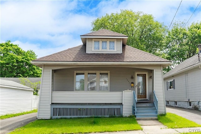 1407 Downer Ave, Utica, NY 13502 - view of front of property with covered porch and roof with shingles