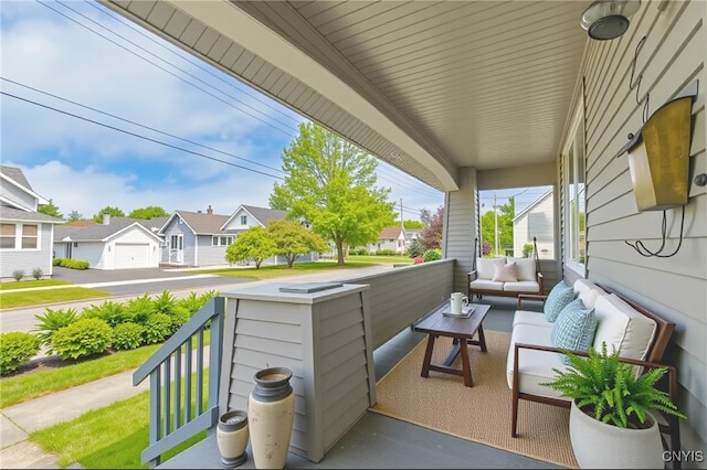 1407 Downer Ave, Utica, NY 13502 - covered porch with a residential view and an outdoor hangout area