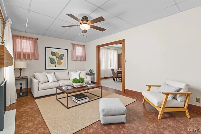 1407 Downer Ave, Utica, NY 13502 - living room with a drop ceiling and ceiling fan