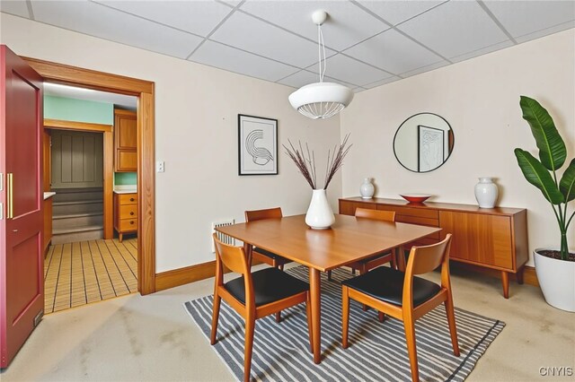 1407 Downer Ave, Utica, NY 13502 - dining space featuring light carpet and a drop ceiling