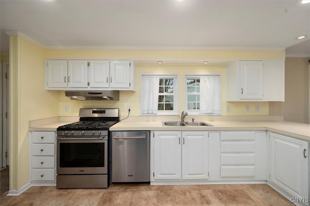 kitchen with white cabinetry, sink, crown molding, and stainless steel appliances