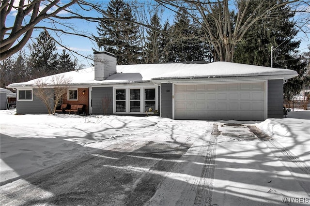 ranch-style house with a garage