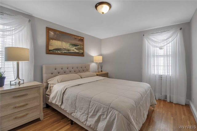 bedroom featuring hardwood / wood-style floors