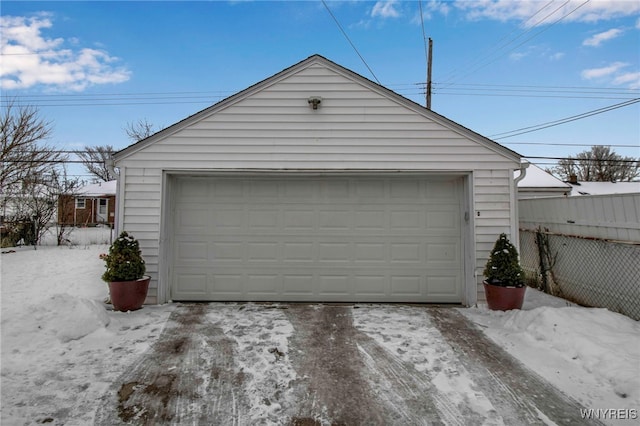 view of snow covered garage