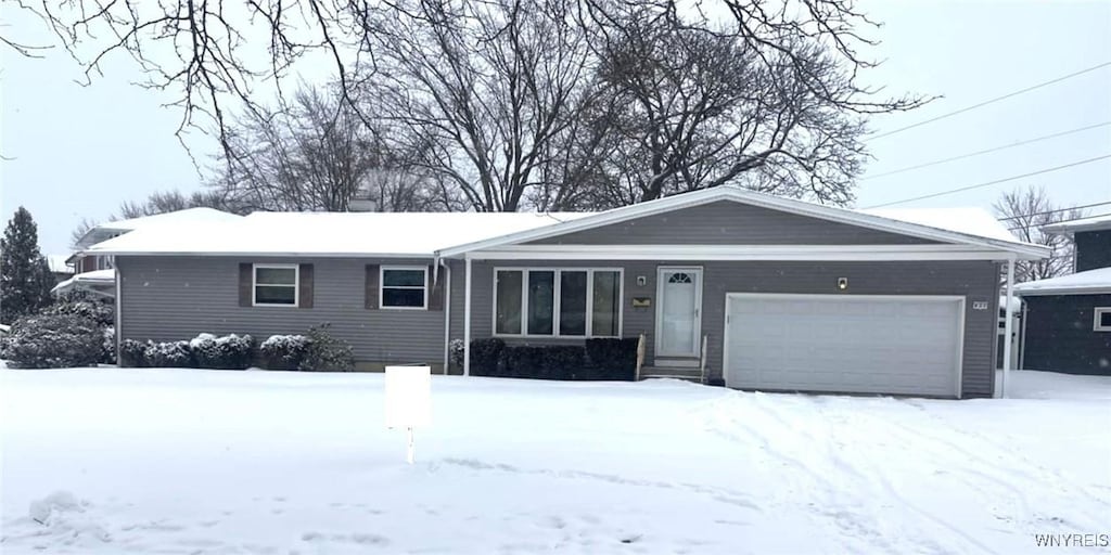 ranch-style house with a garage