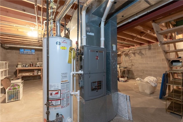 utility room with gas water heater