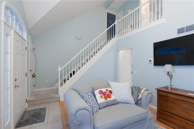 interior space featuring high vaulted ceiling