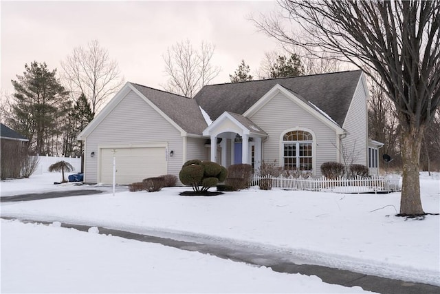 ranch-style house featuring a garage