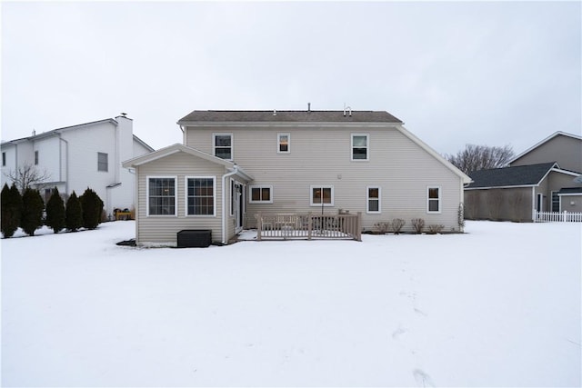 view of snow covered house