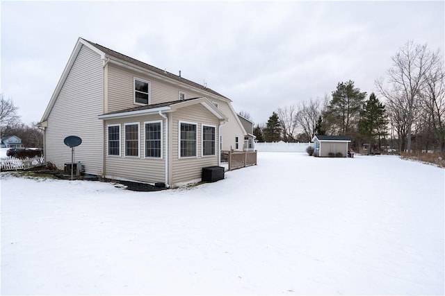 view of snow covered house