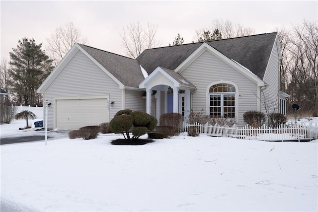 single story home featuring a garage