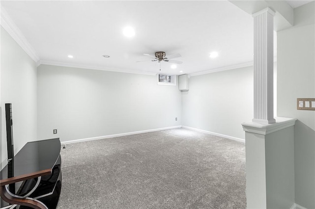 carpeted empty room featuring crown molding, ceiling fan, and decorative columns