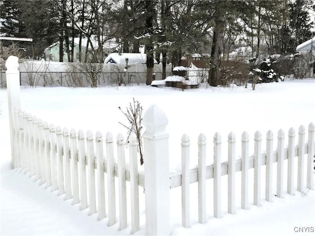 view of yard layered in snow