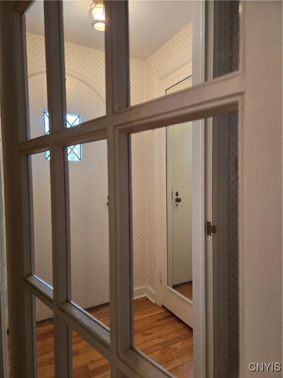 doorway to outside with hardwood / wood-style floors