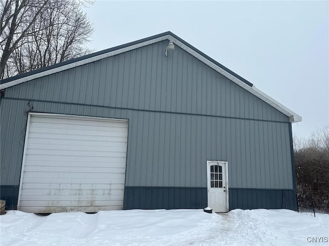 view of snow covered garage