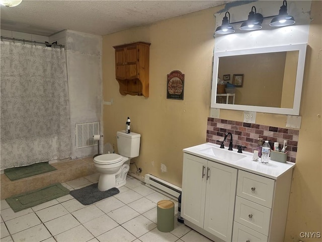 bathroom with tile patterned flooring, toilet, decorative backsplash, vanity, and a baseboard heating unit