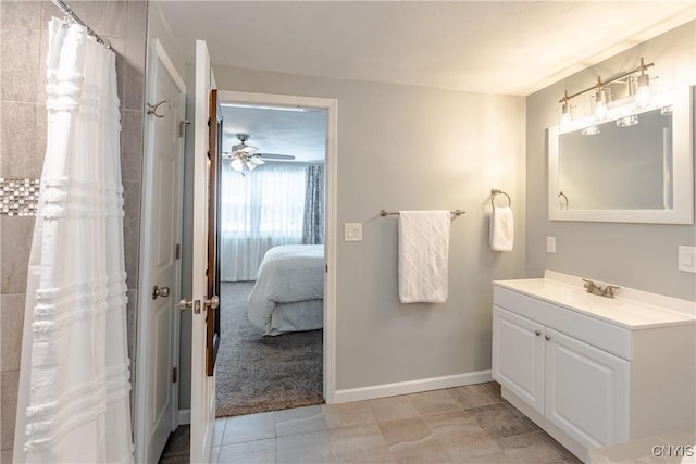 bathroom featuring vanity and ceiling fan