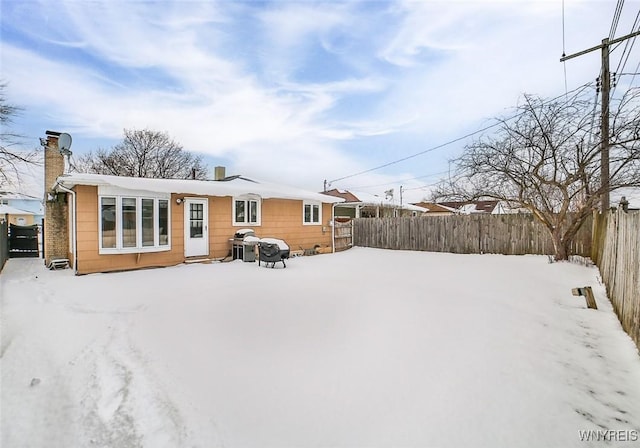 view of snow covered property