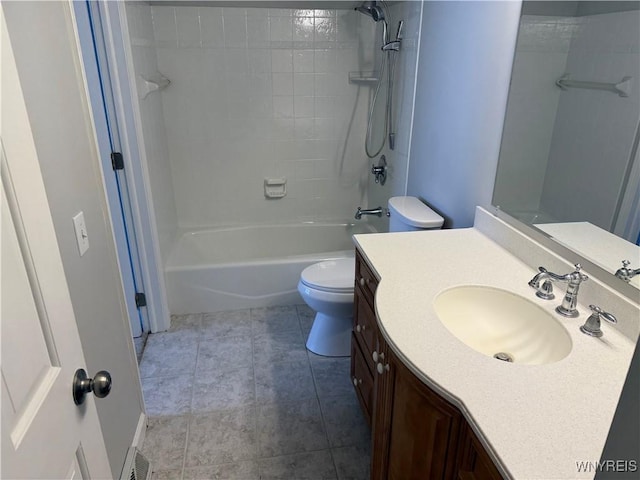 full bathroom featuring tile patterned floors, vanity, toilet, and bathing tub / shower combination