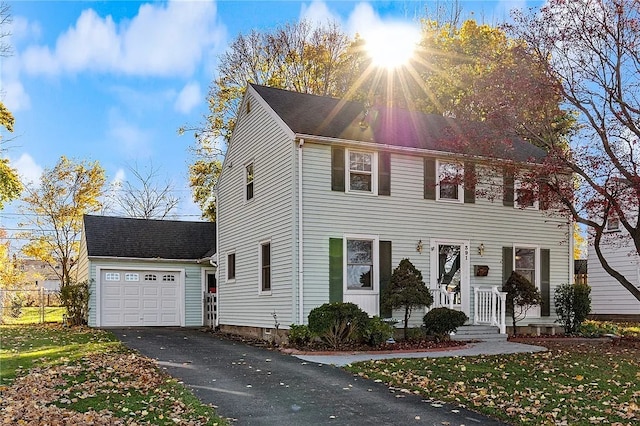 colonial home featuring a garage