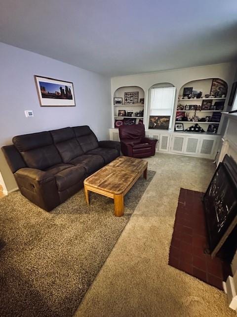 living room with carpet flooring and built in features