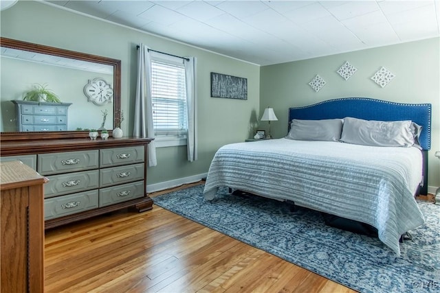 bedroom featuring light hardwood / wood-style floors