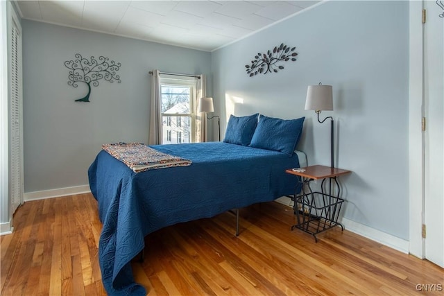 bedroom featuring hardwood / wood-style floors