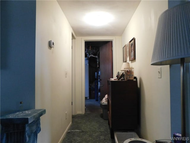 corridor with dark carpet