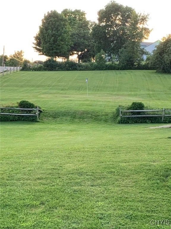 view of community featuring a lawn