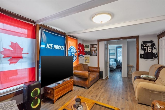 interior space featuring beamed ceiling and wood-type flooring