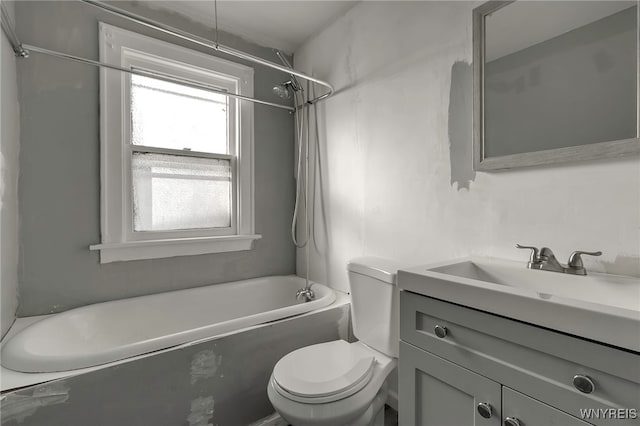 full bathroom with vanity, shower / tub combination, and toilet