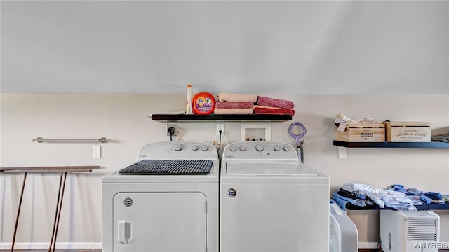 laundry room with independent washer and dryer