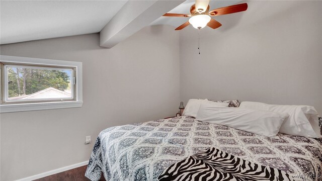 bedroom with hardwood / wood-style flooring, lofted ceiling, and ceiling fan