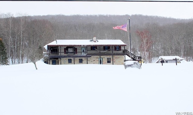 view of snow covered property