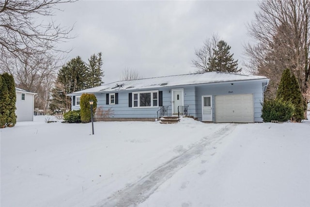 single story home with a garage