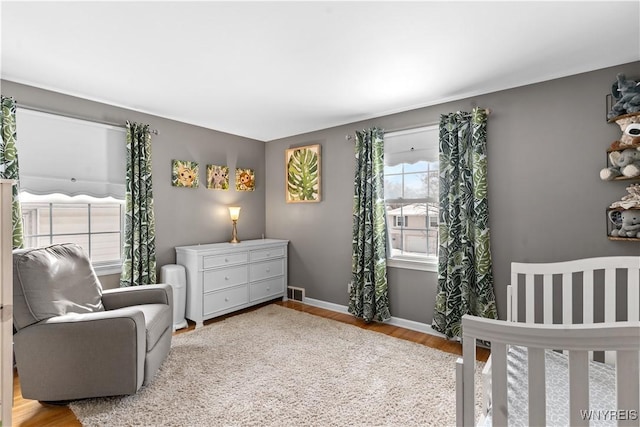 bedroom featuring light hardwood / wood-style flooring