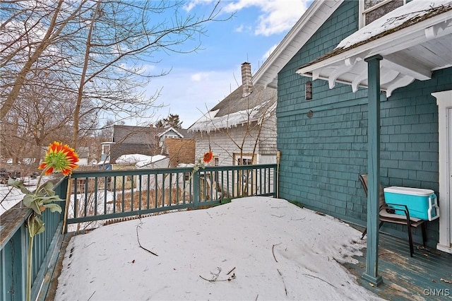 view of snow covered deck