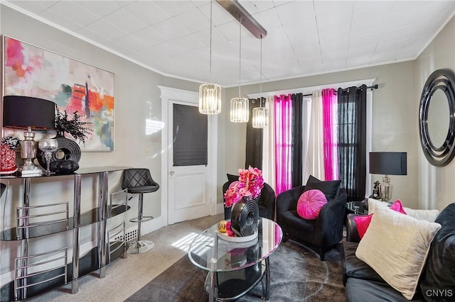 living room with crown molding and carpet flooring