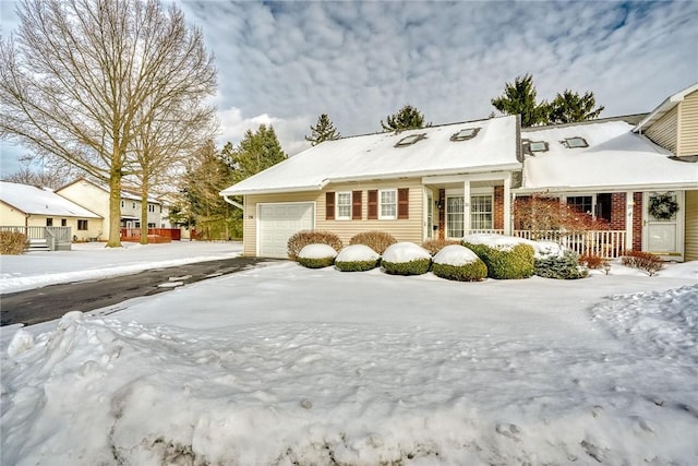 view of front of property featuring a garage