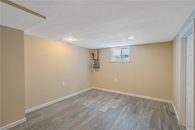 basement with wood-type flooring