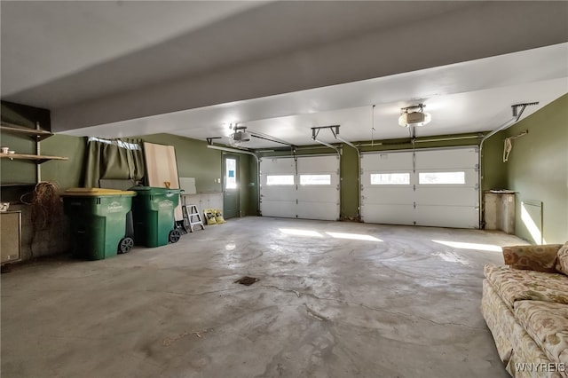 garage featuring a garage door opener