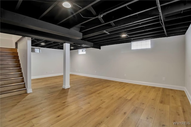 basement with wood-type flooring