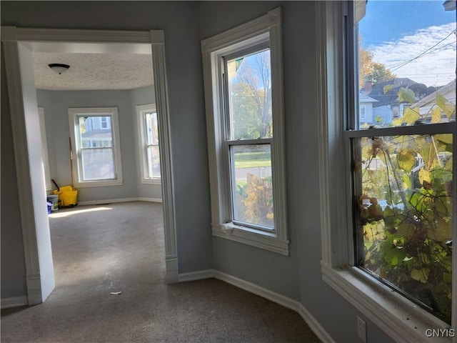 empty room with a textured ceiling