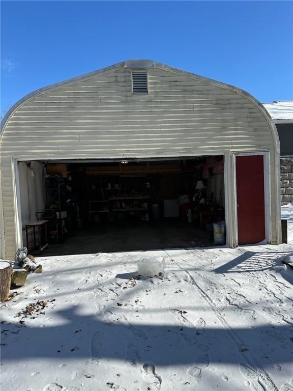 view of snow covered garage