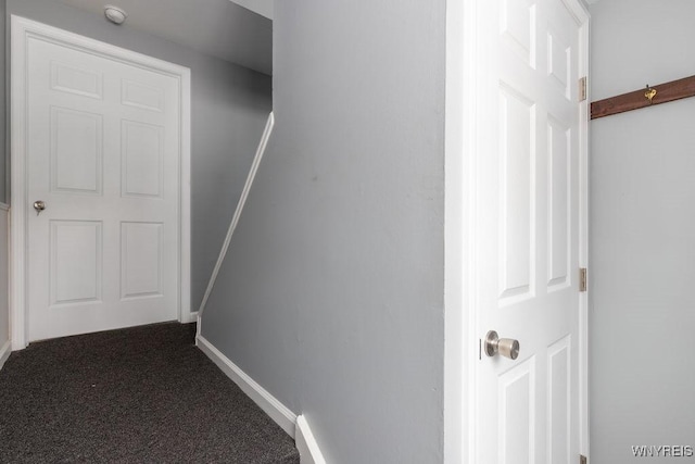 corridor with carpet floors