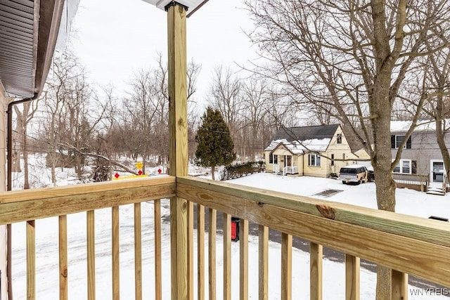 view of snow covered deck