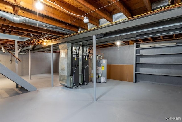 basement with heating unit and water heater