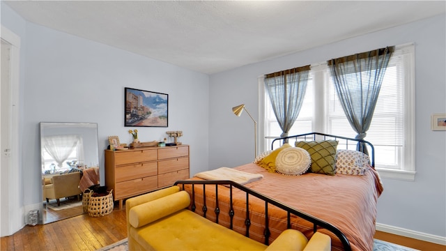 bedroom featuring hardwood / wood-style floors