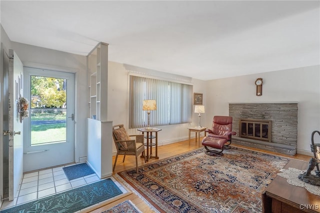 living room featuring a fireplace