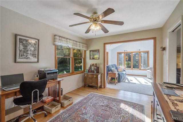 office area featuring ceiling fan and light hardwood / wood-style floors